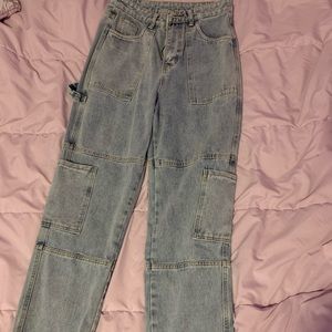 a pair of cargo shein jeans